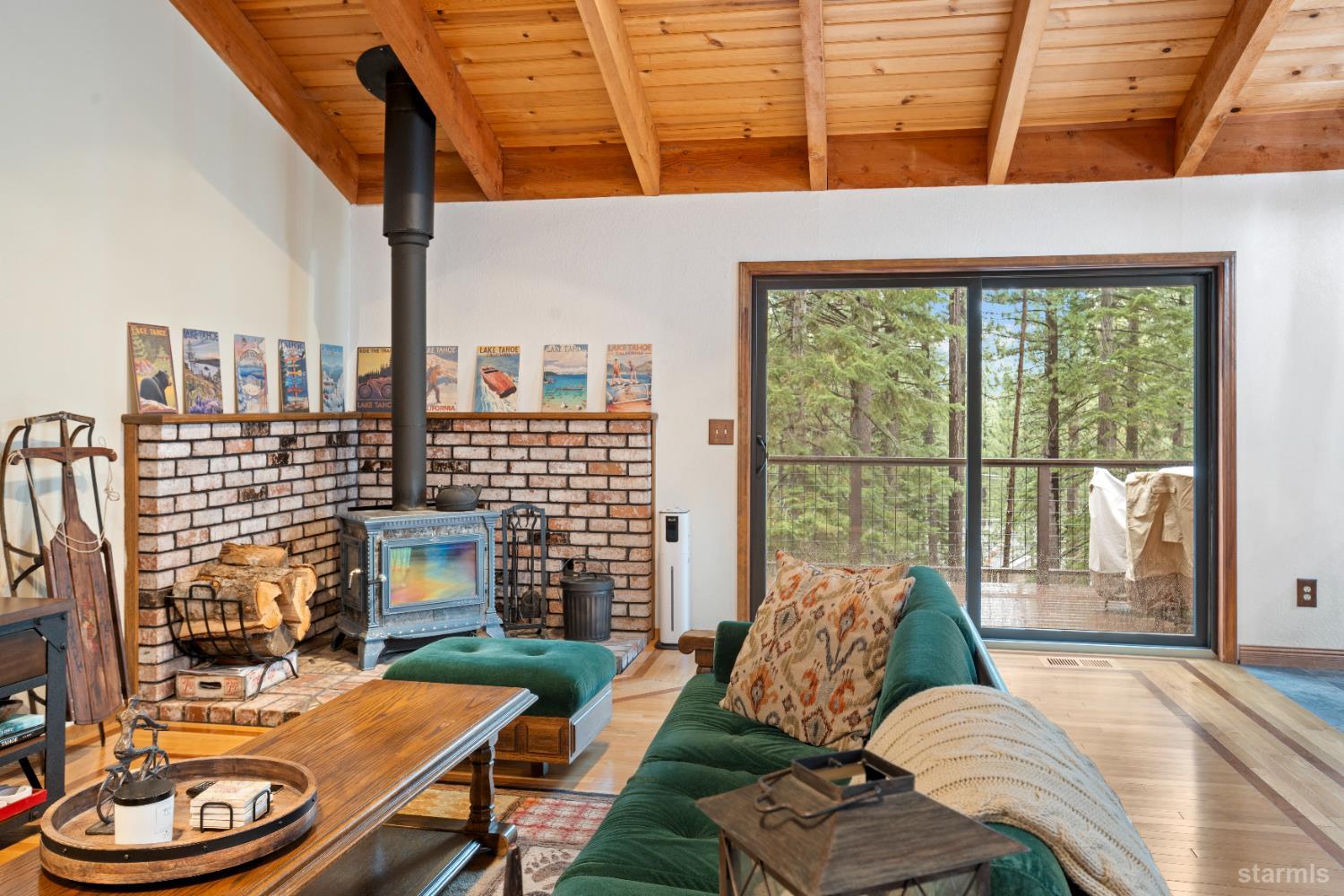 1408 Pebble Beach Road South Lake Tahoe, CA 96150 - Photo 10 of 34 a living room with furniture and a large window