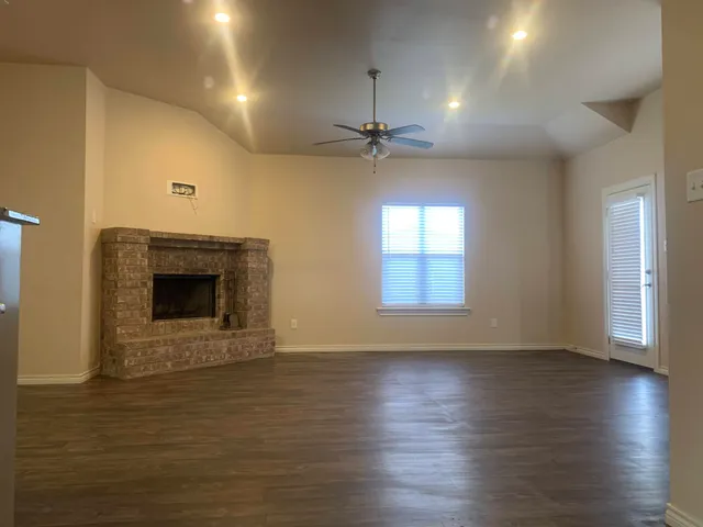 a black and white photo of a living room