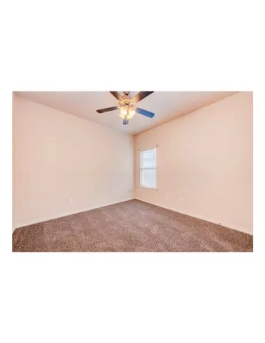 a black and white photo of a living room