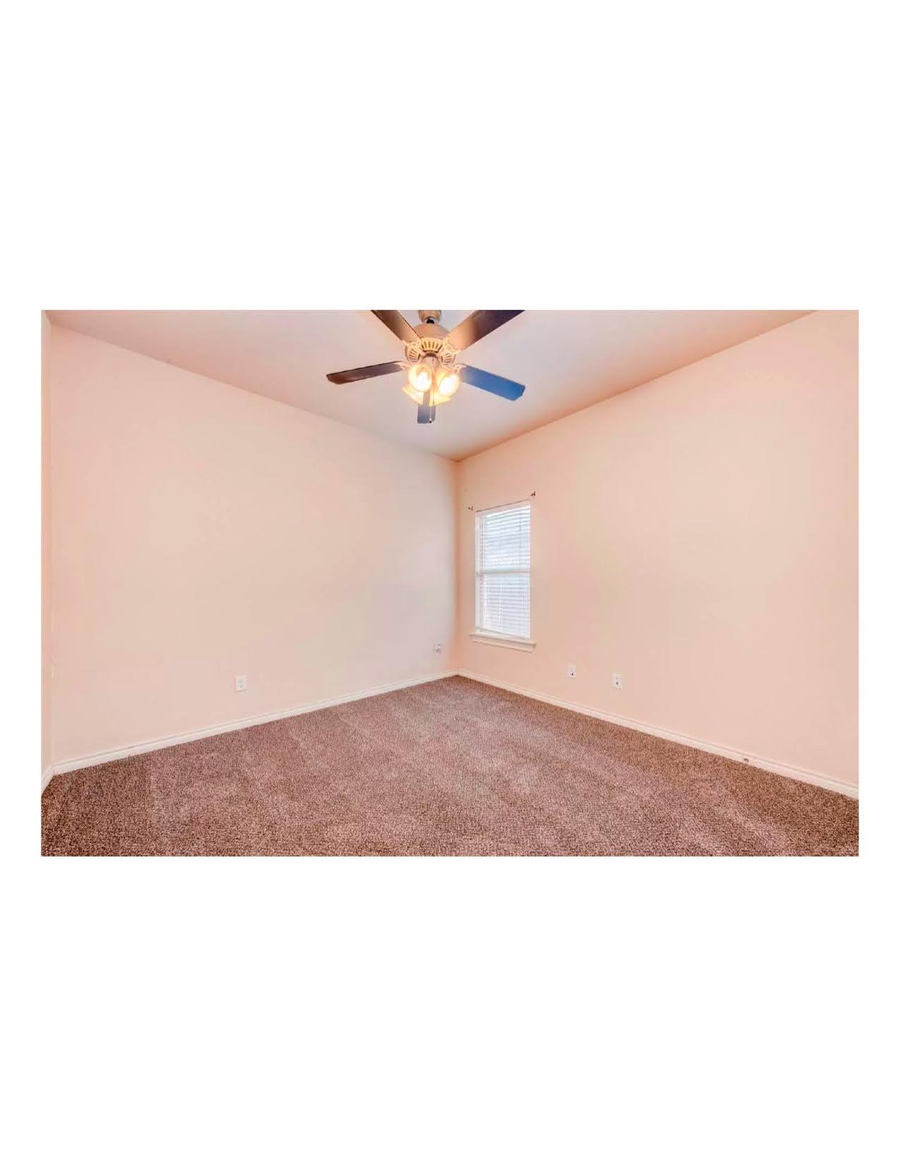 10103 Waco Avenue Lubbock, TX 79423 - Photo 2 of 14 a black and white photo of a room