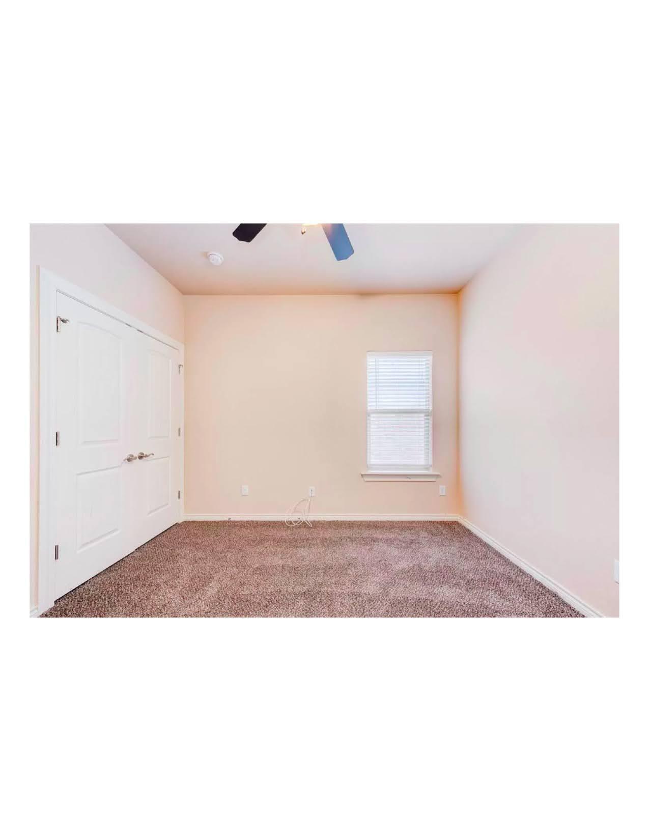 10103 Waco Avenue Lubbock, TX 79423 - Photo 4 of 14 a black and white photo of a living room