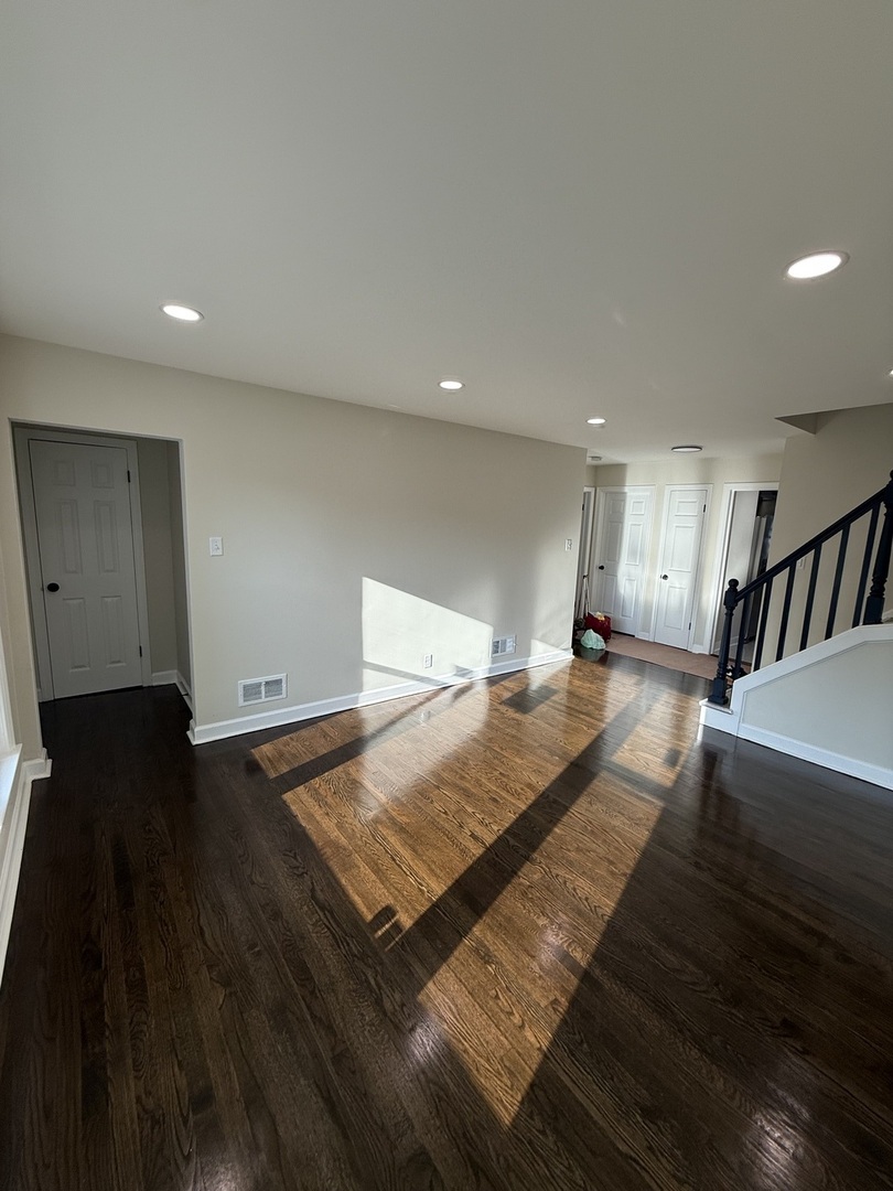18351 Dixie Highway Homewood, IL 60430 - Photo 8 of 11 a view of an empty room with wooden floor