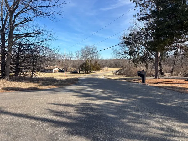 a view of street with houses