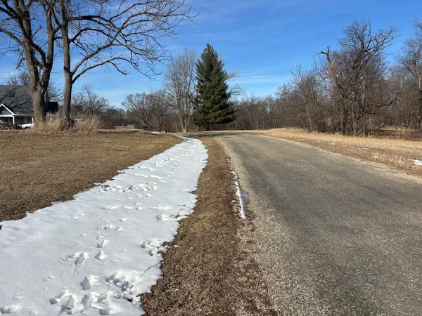 a view of road with yard
