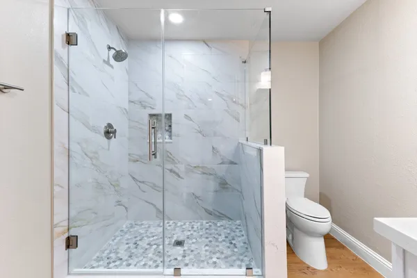 a bathroom with a toilet and a sink