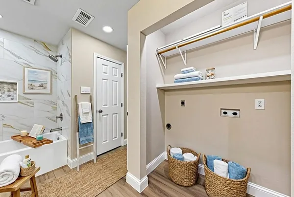 a view of interior space with wooden floor and garden view