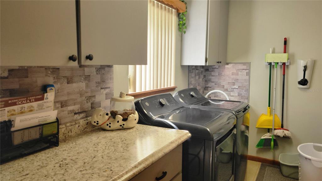 7858 Southwest 112th Lane Ocala, FL 34476 - Photo 13 of 25 a bathroom with a sink a toilet and tub