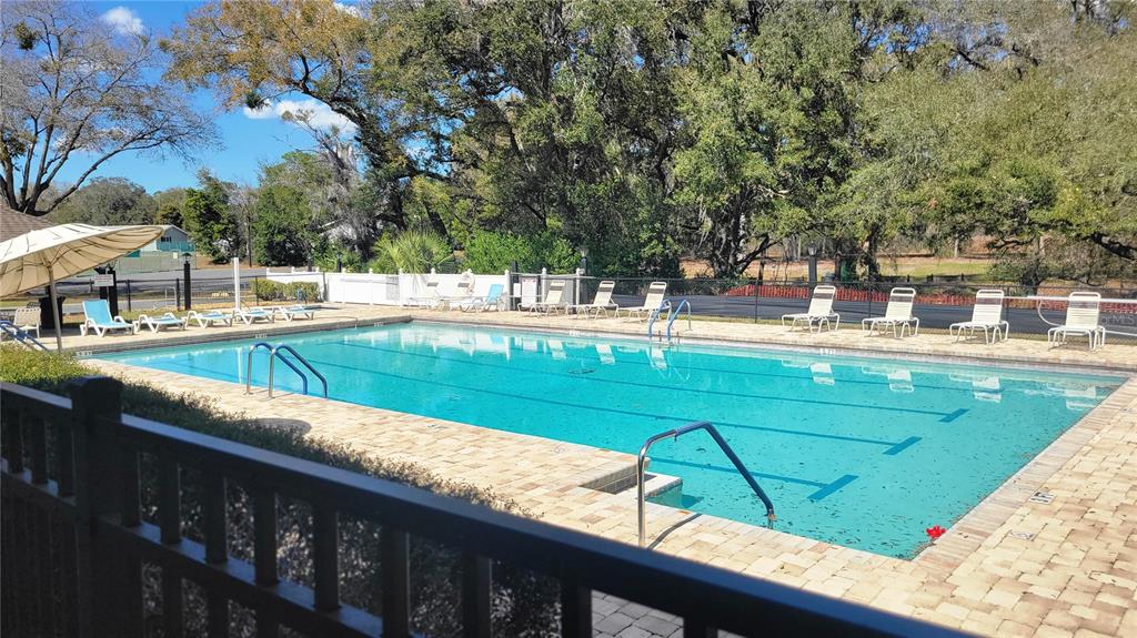 7858 Southwest 112th Lane Ocala, FL 34476 - Photo 22 of 25 a view of swimming pool from a balcony