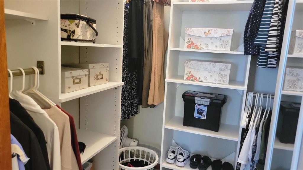 7858 Southwest 112th Lane Ocala, FL 34476 - Photo 10 of 25 a room with furniture and a fireplace