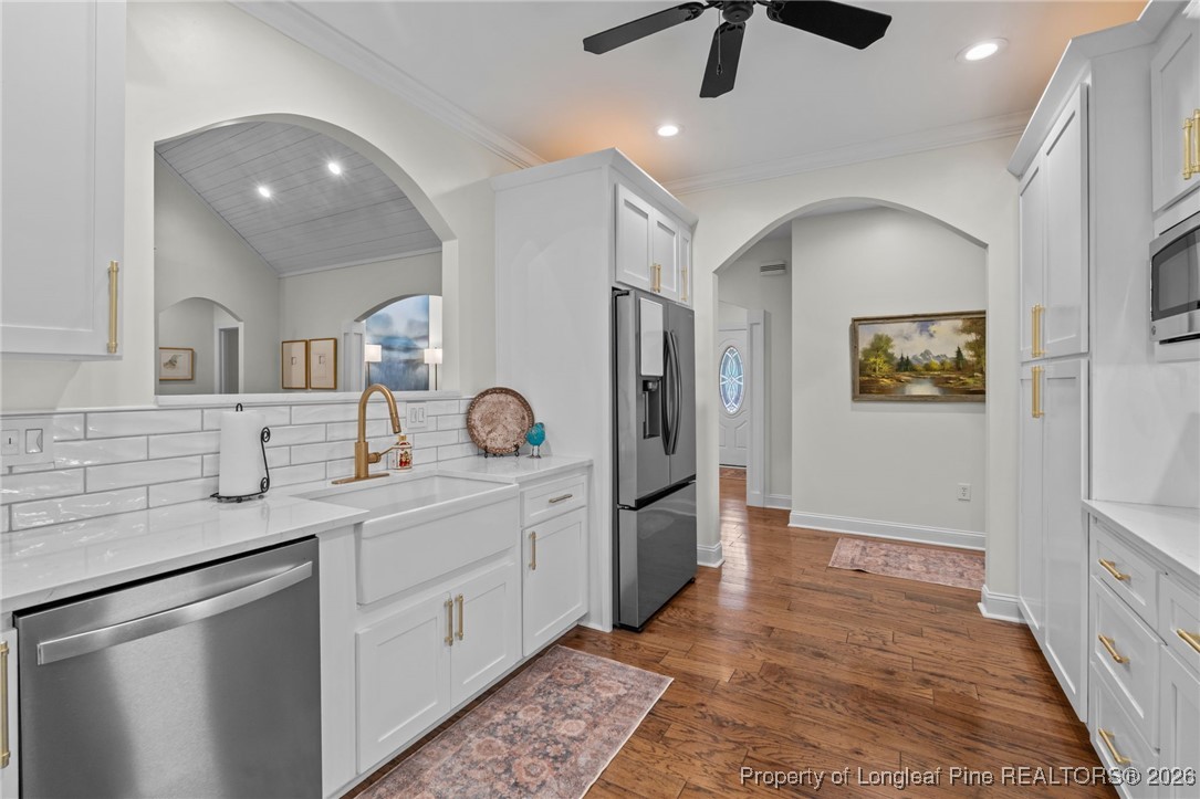30181 East Lake Road Wagram, NC 28396 - Photo 15 of 38 a spacious bathroom with a granite countertop sink mirror and shower