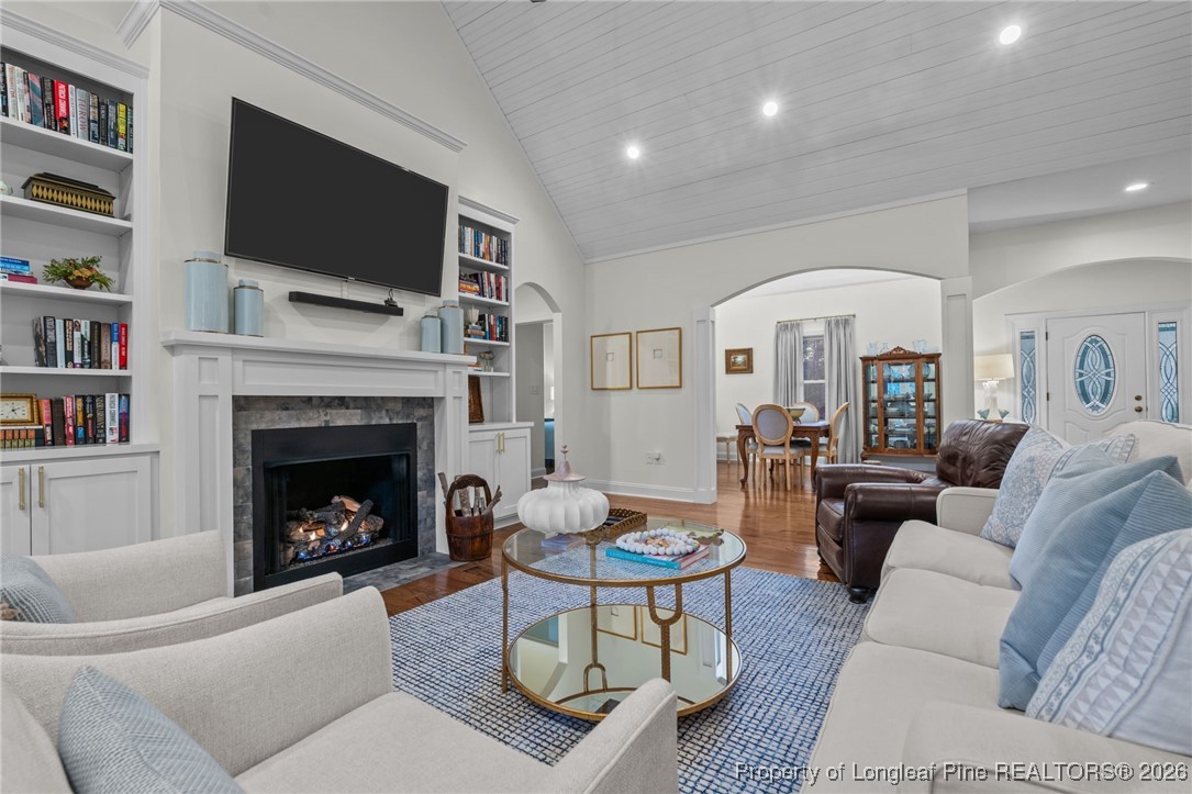 30181 East Lake Road Wagram, NC 28396 - Photo 21 of 38 a living room with furniture fireplace and flat screen tv