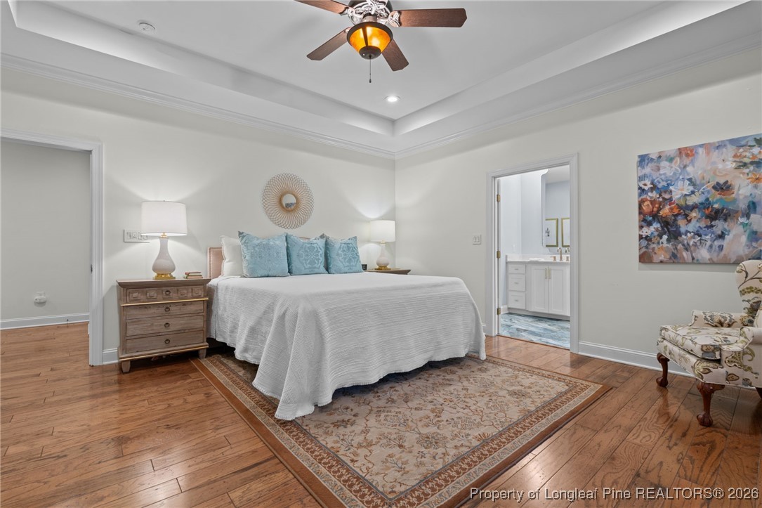 30181 East Lake Road Wagram, NC 28396 - Photo 27 of 38 a bedroom with a bed and window