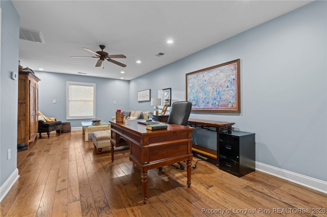 30181 East Lake Road Wagram, NC 28396 - Photo 37 of 38 a living room with furniture and wooden floor