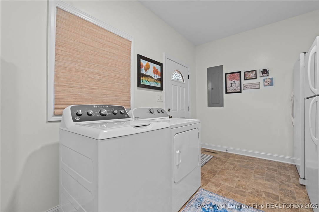 30181 East Lake Road Wagram, NC 28396 - Photo 38 of 38 a utility room with dryer and washer