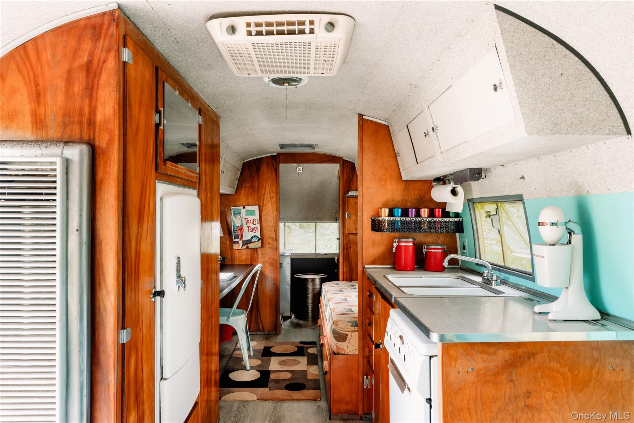 1680 Gulf Road North Branch, NY 12766 - Photo 41 of 46 a bathroom with a sink a mirror and shower