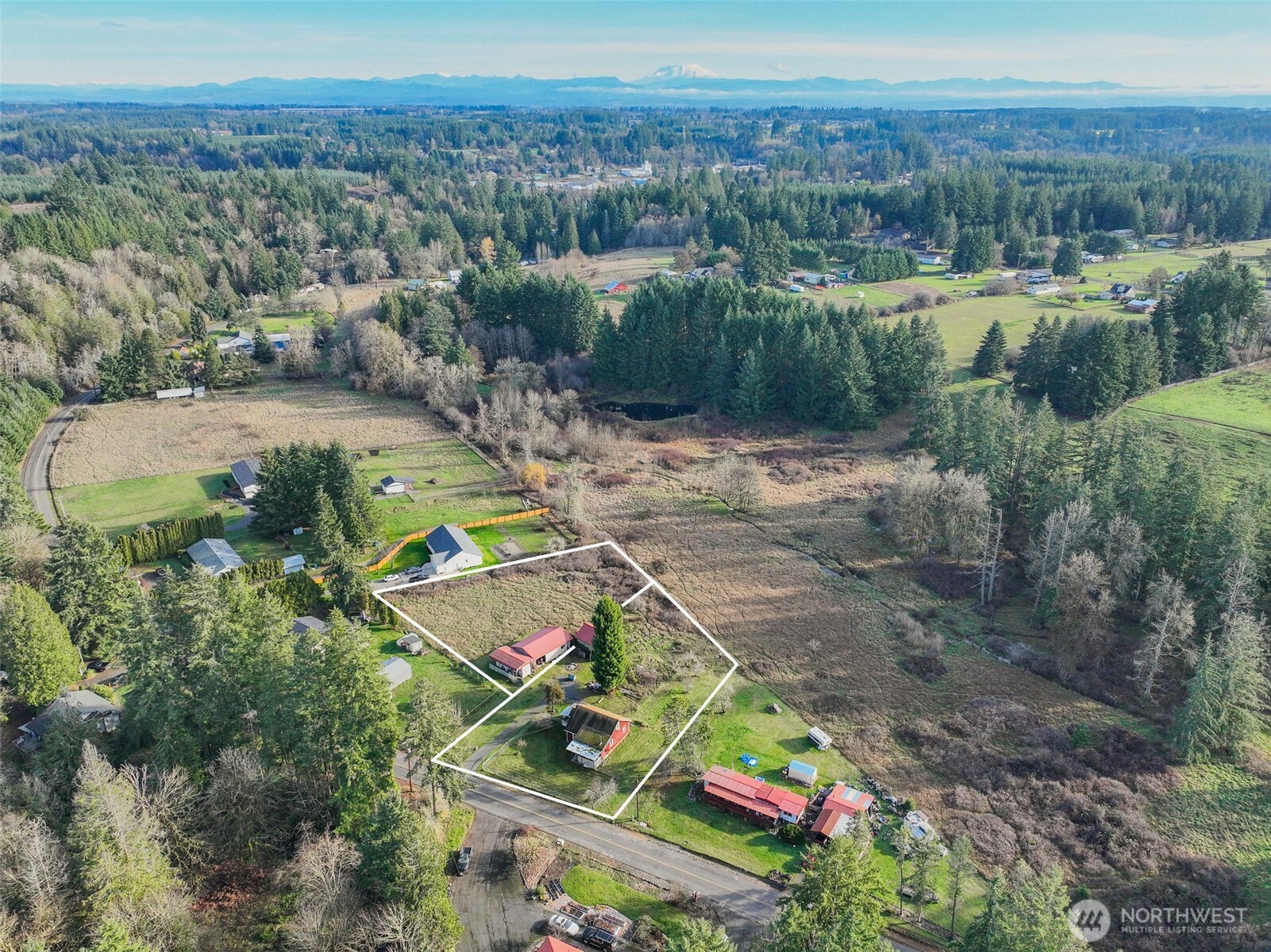 917 Byham Road Winlock, WA 98596 - Photo 17 of 19 an aerial view of residential houses with outdoor space and lake view
