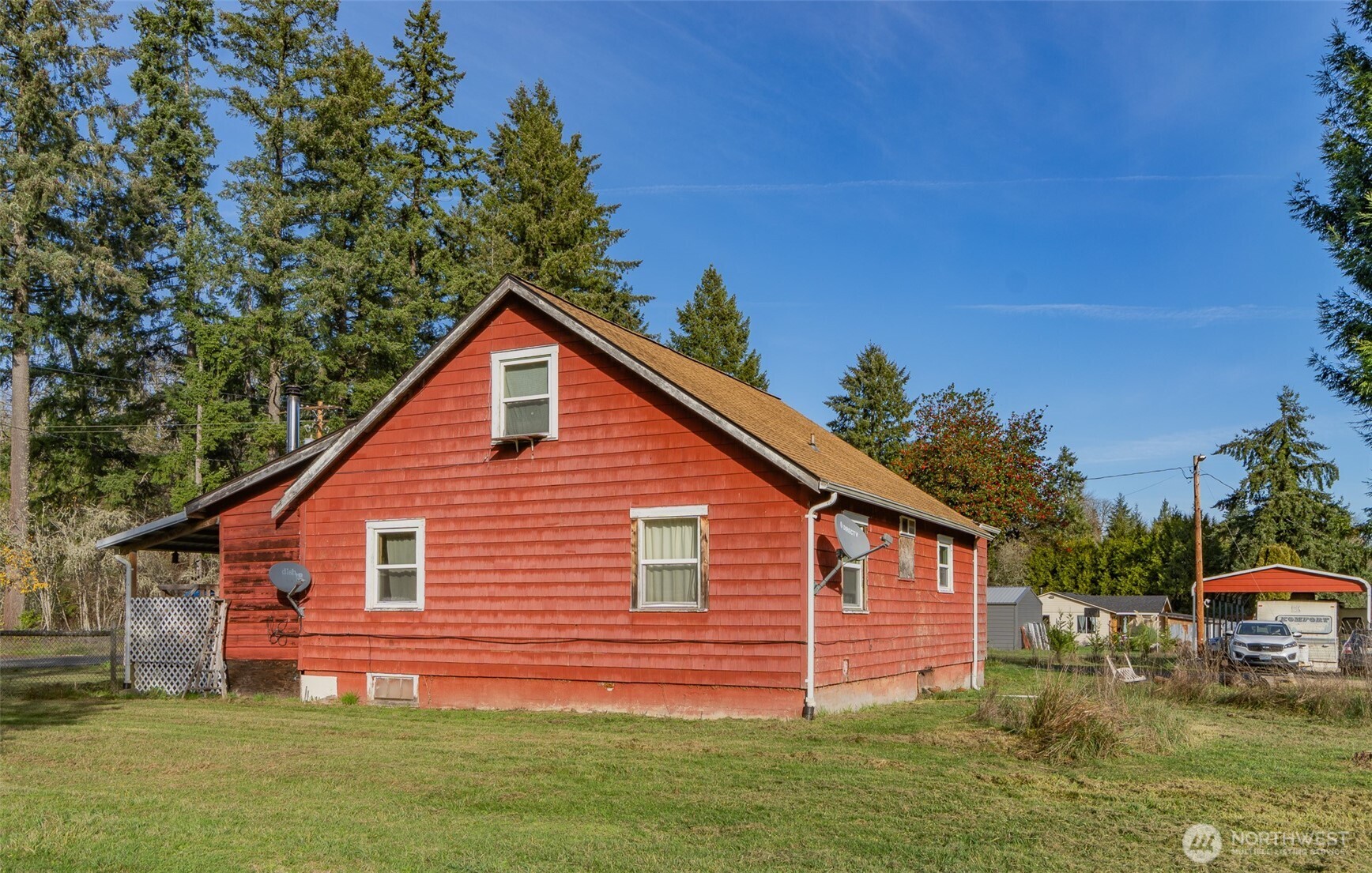 917 Byham Road Winlock, WA 98596 - Photo 10 of 17 a view of a backyard with plants and large tree