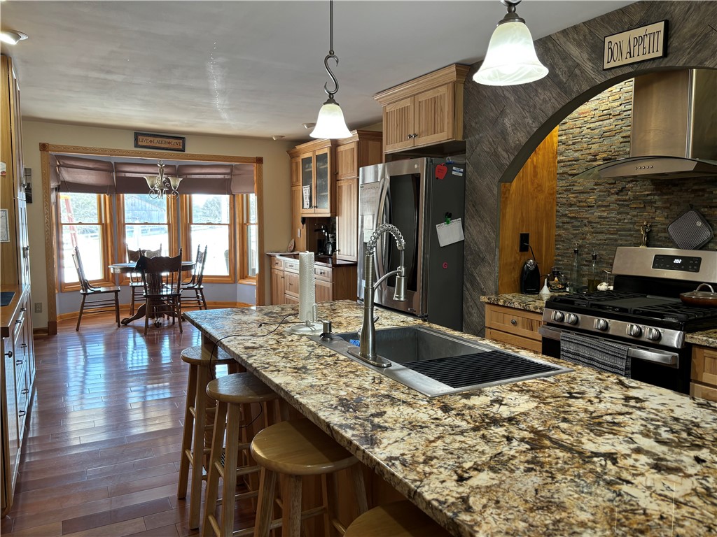 172 Hawks Road Pittsfield, NY 13411 - Photo 5 of 45 Granite counters with double sink and range to ple