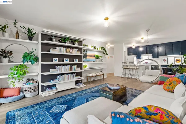 a bedroom with 2 bed and a window