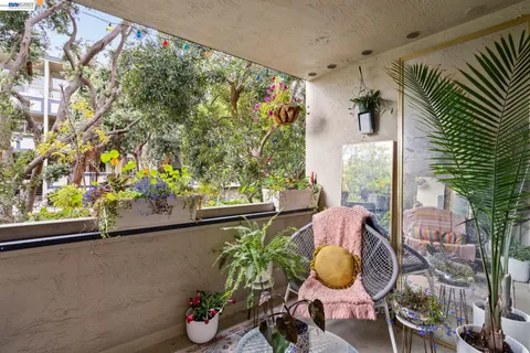 a view of parking garage with cars