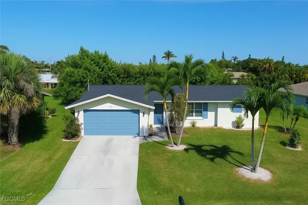 a house view with a garden space