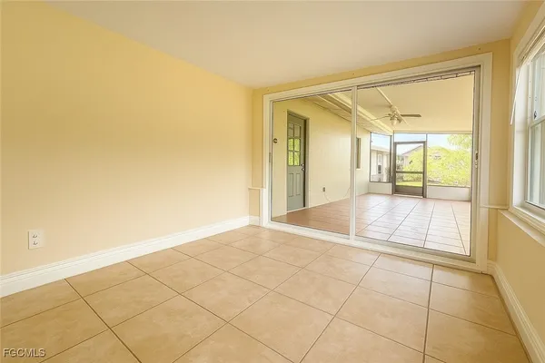 a view of an empty room and window