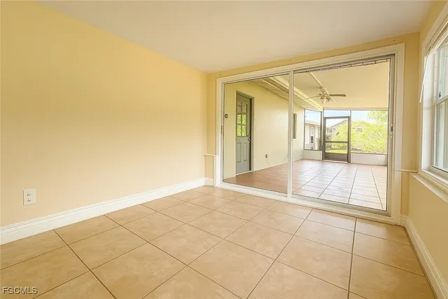 a view of an empty room and window