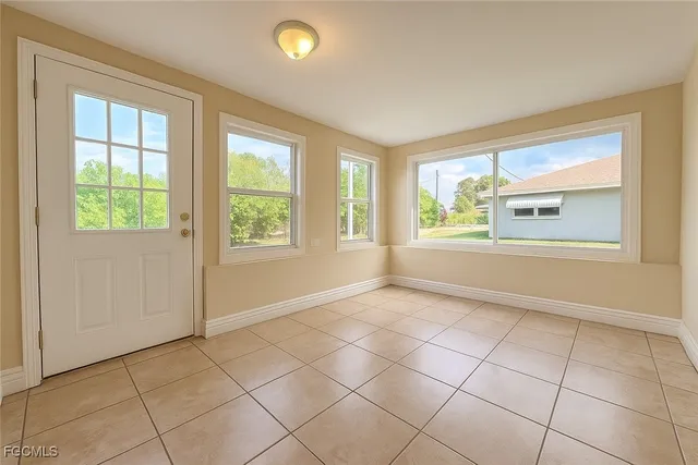 an empty room with windows