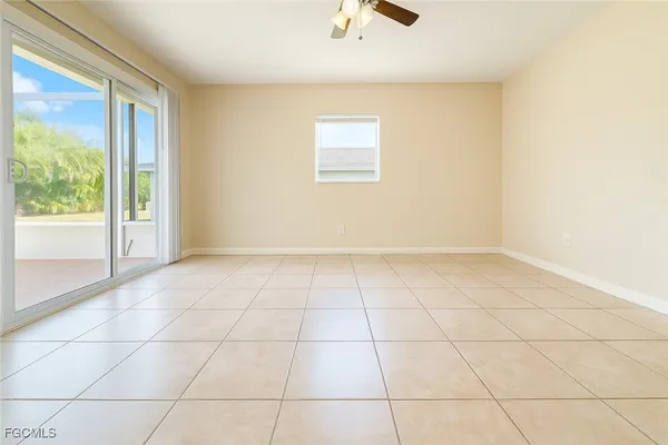 a view of an empty room and window
