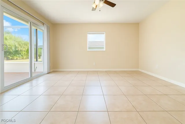 a view of an empty room and window