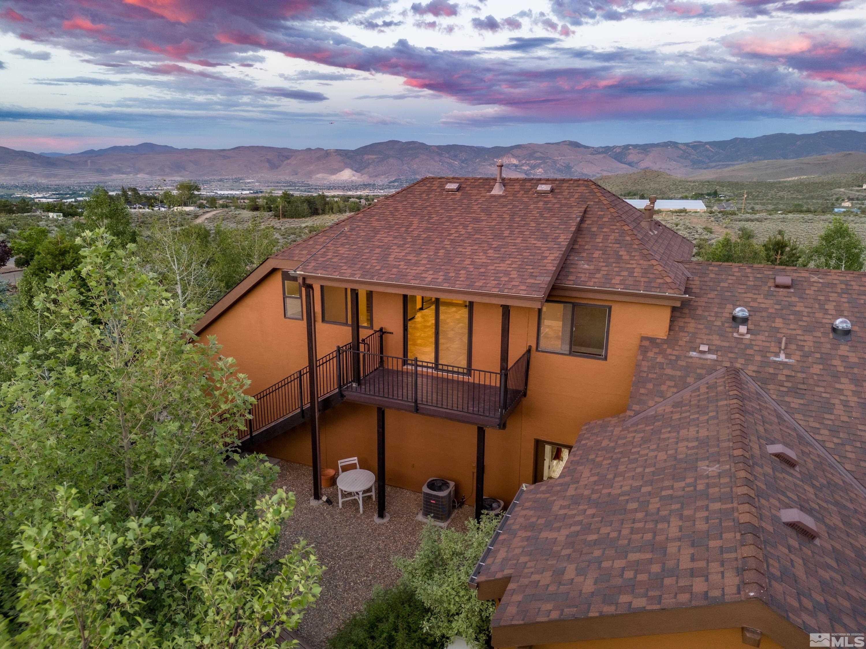 5745 Carl Drive Reno, NV 89511 - Photo 22 of 40 a aerial view of a house with a yard