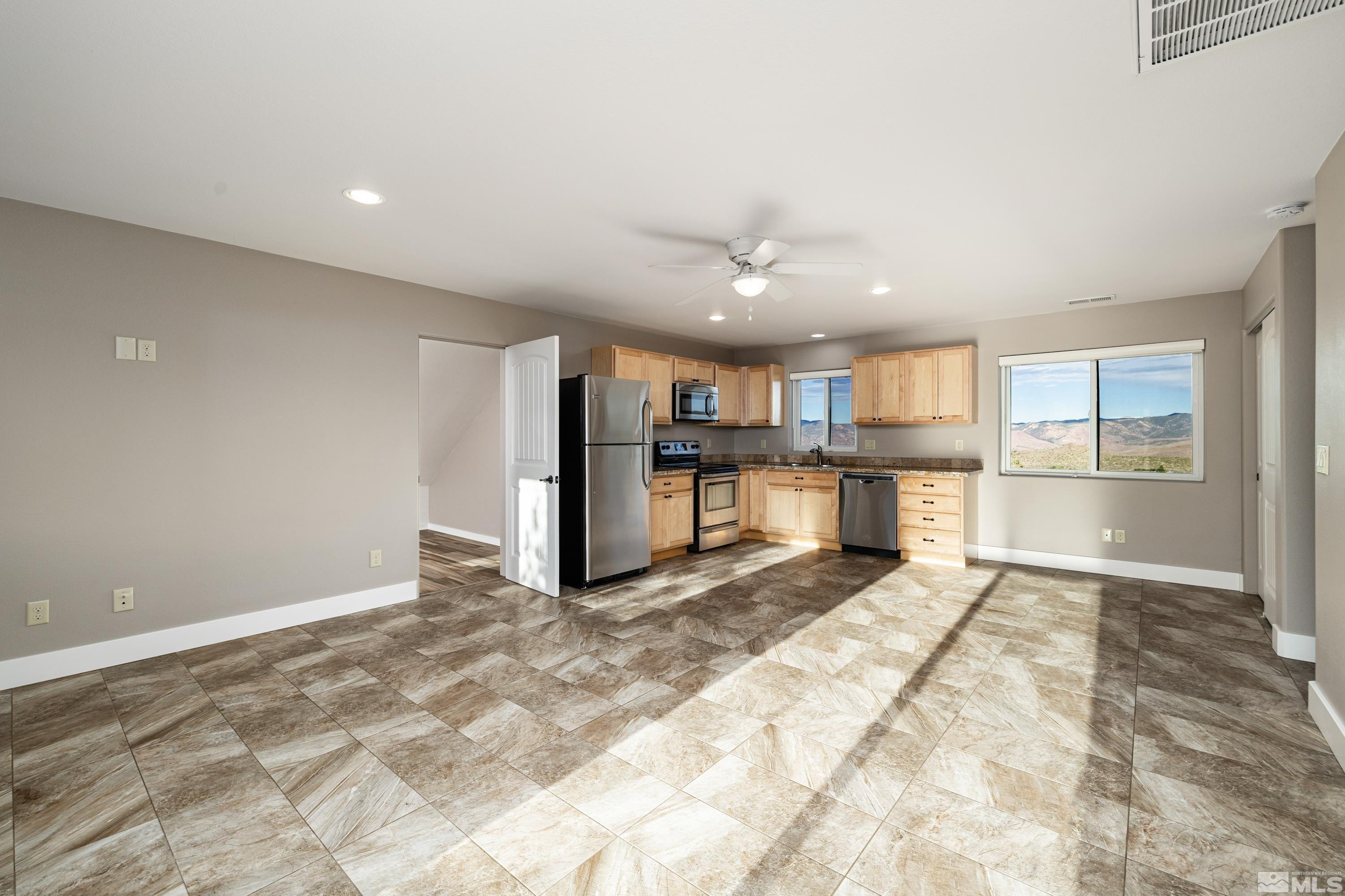 5745 Carl Drive Reno, NV 89511 - Photo 25 of 40 a view of a kitchen with refrigerator and kitchen