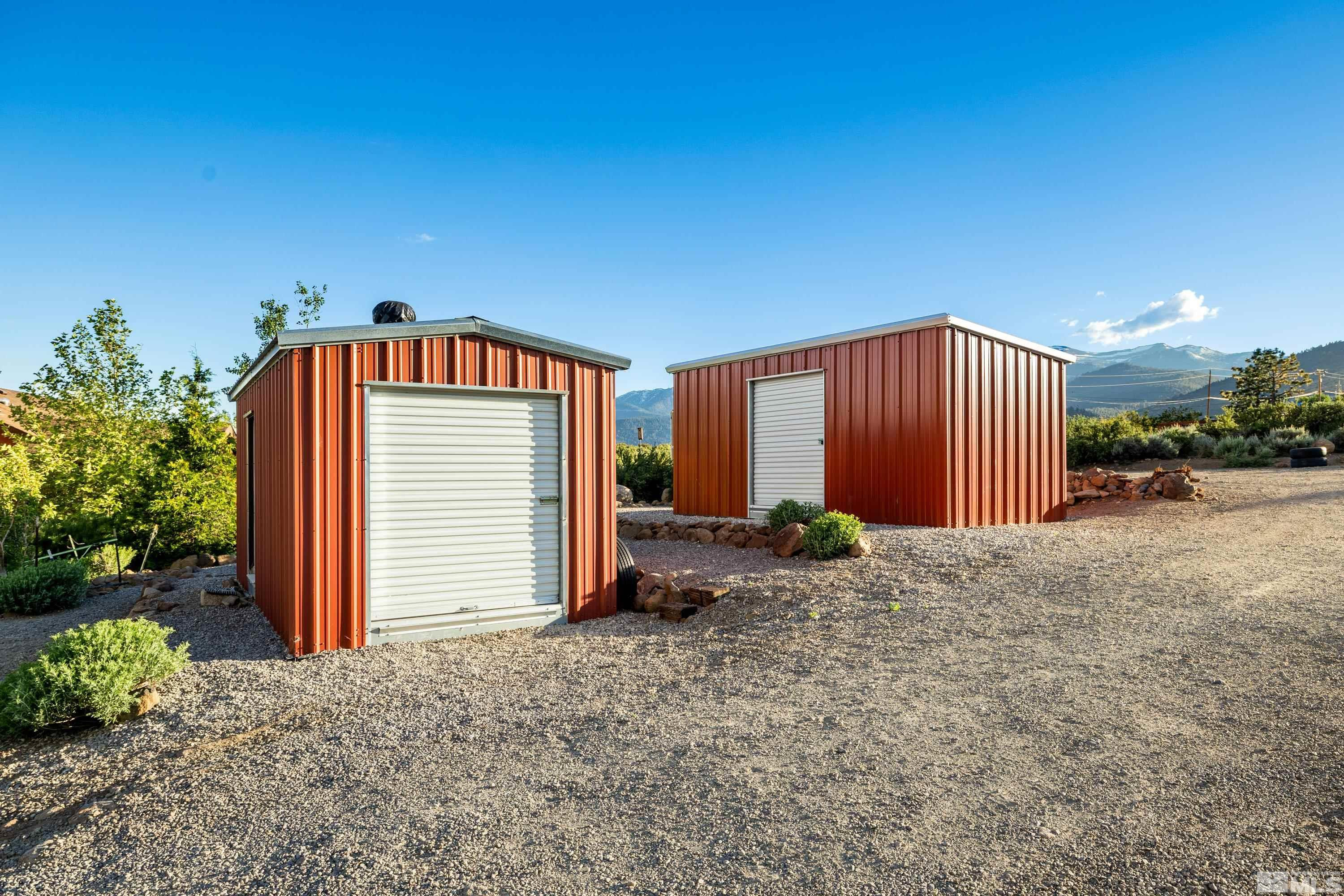5745 Carl Drive Reno, NV 89511 - Photo 38 of 40 a view of a house with backyard and parking