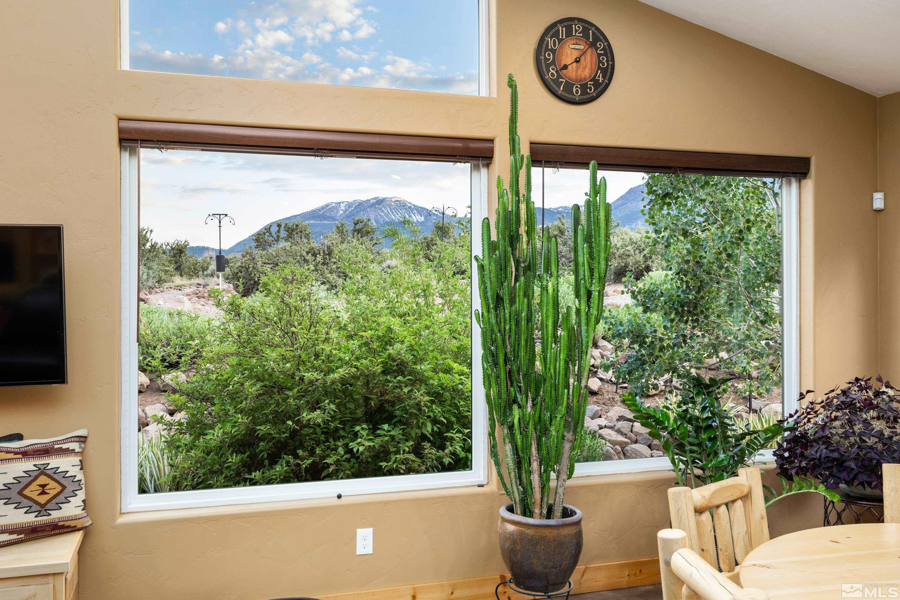 5745 Carl Drive Reno, NV 89511 - Photo 8 of 40 a view of a porch with furniture and garden view
