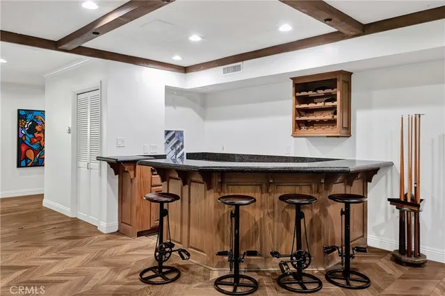 a bathroom with a double vanity sink mirror and shower