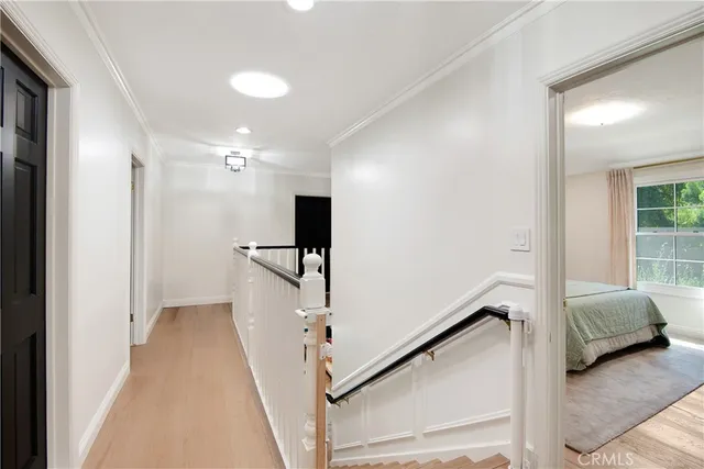 a view of a house with swimming pool and porch