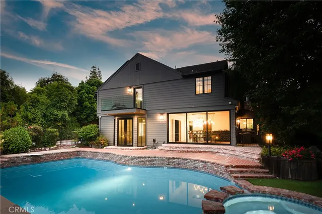 a view of a patio with swimming pool