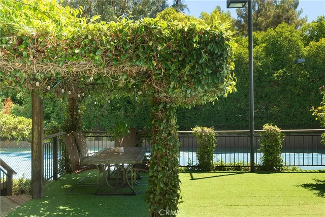 a view of a backyard with a small cabin