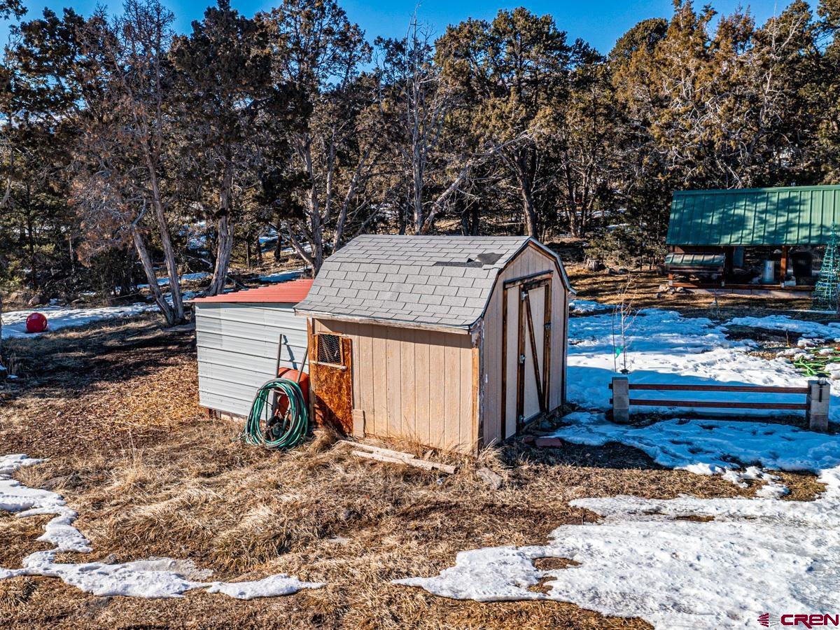 19987 Green Valley Road Cedaredge, CO 81413 - Photo 22 of 25 a view of a backyard of the house