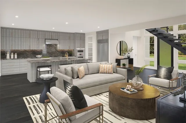 a living room with furniture kitchen view and a wooden floor