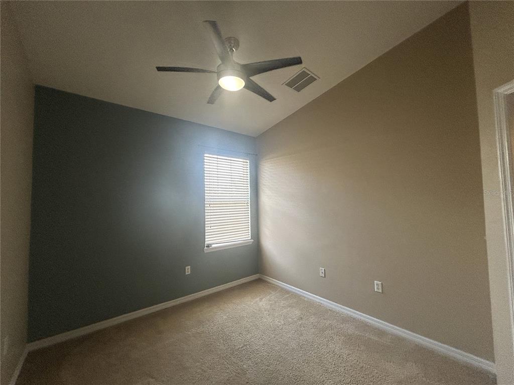 9036 Moonlit Meadows Loop Riverview, FL 33578 - Photo 15 of 20 a view of an empty room with a window