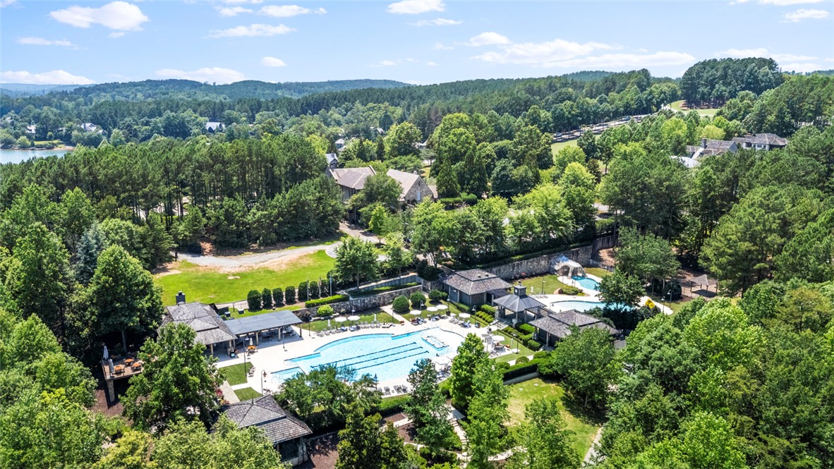 130 River Ridge Road Sunset, SC 29685 - Photo 43 of 47 An aerial perspective reveals a vibrant community with recreational amenities nestled amidst a verdant landscape.