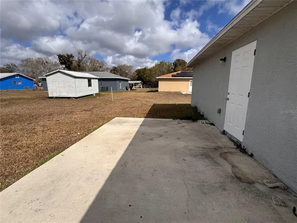 a view of a lake with a big yard