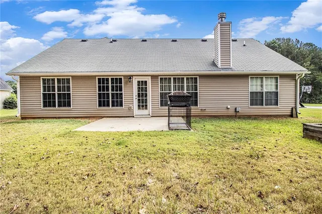 a house view with a garden space