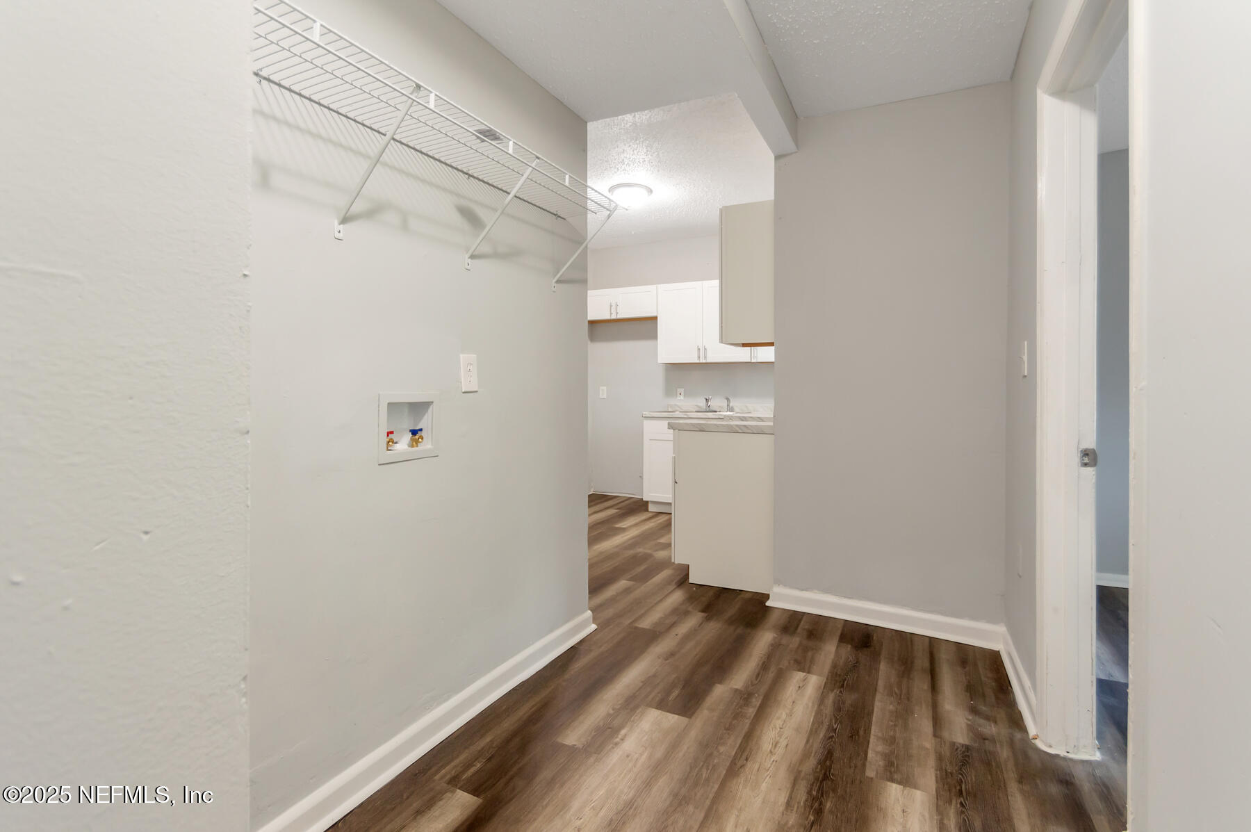 1165 Hart Street Jacksonville, FL 32209 - Photo 16 of 22 a view of empty room with wooden floor