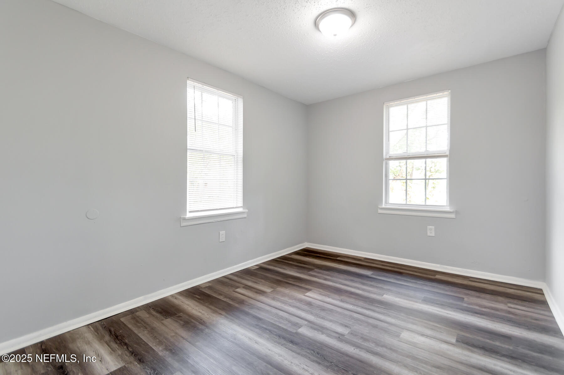 1165 Hart Street Jacksonville, FL 32209 - Photo 20 of 22 a view of a room with wooden floor and windows