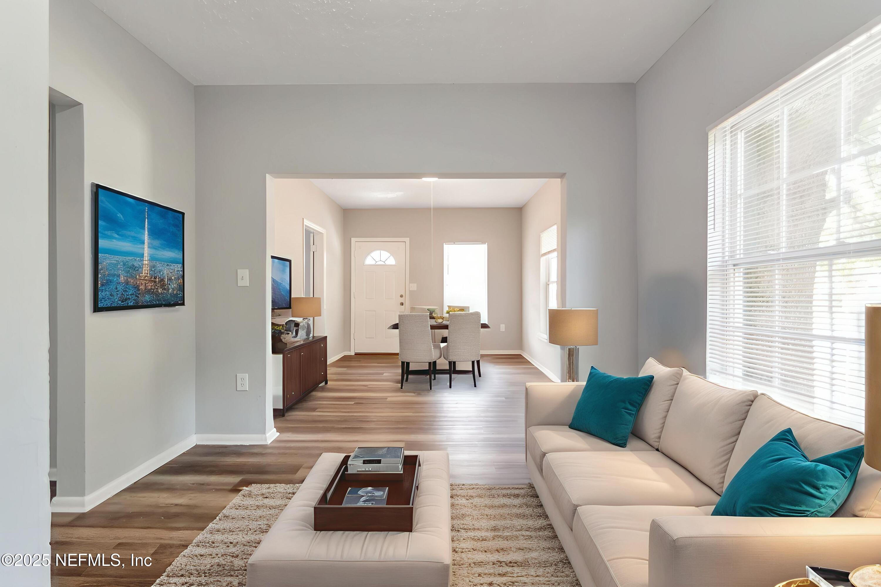 1165 Hart Street Jacksonville, FL 32209 - Photo 5 of 22 a living room with furniture and a large window