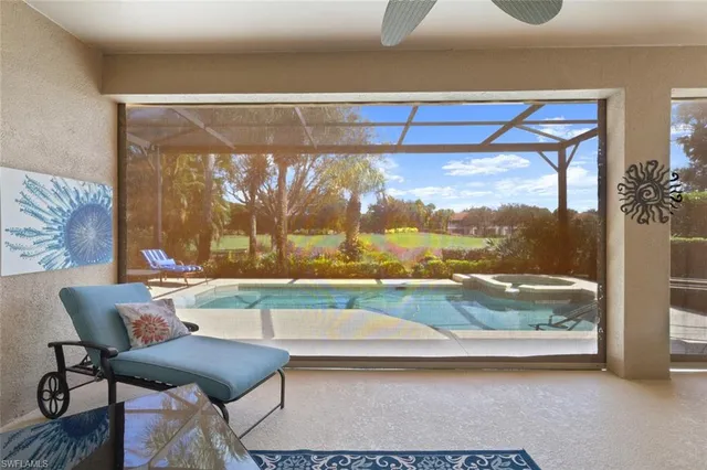 a living room with a couch and a table