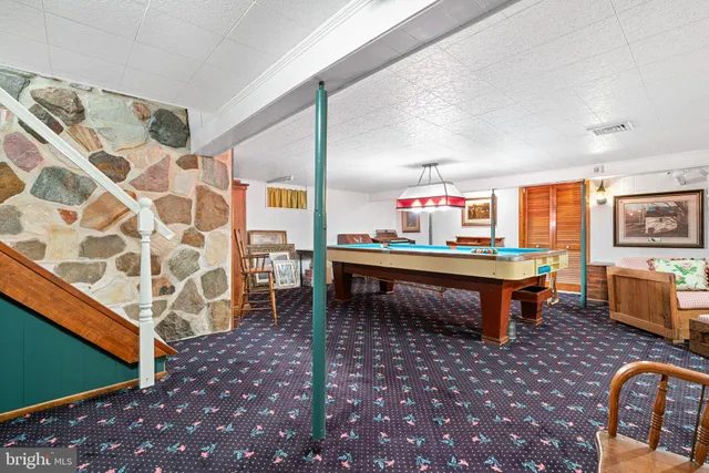 a view of a chairs and table in a room