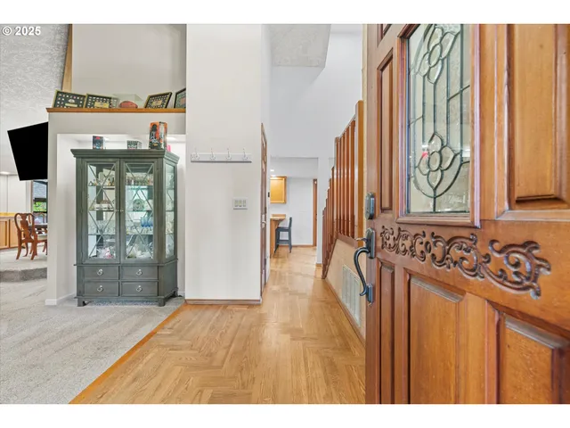 a view of a entryway with wooden floor